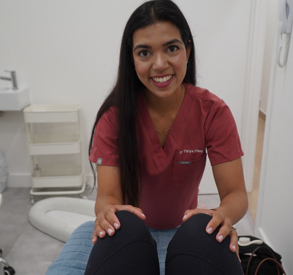 Dr Thriya providing gentle pregnancy chiropractic care for mums in Wimbledon